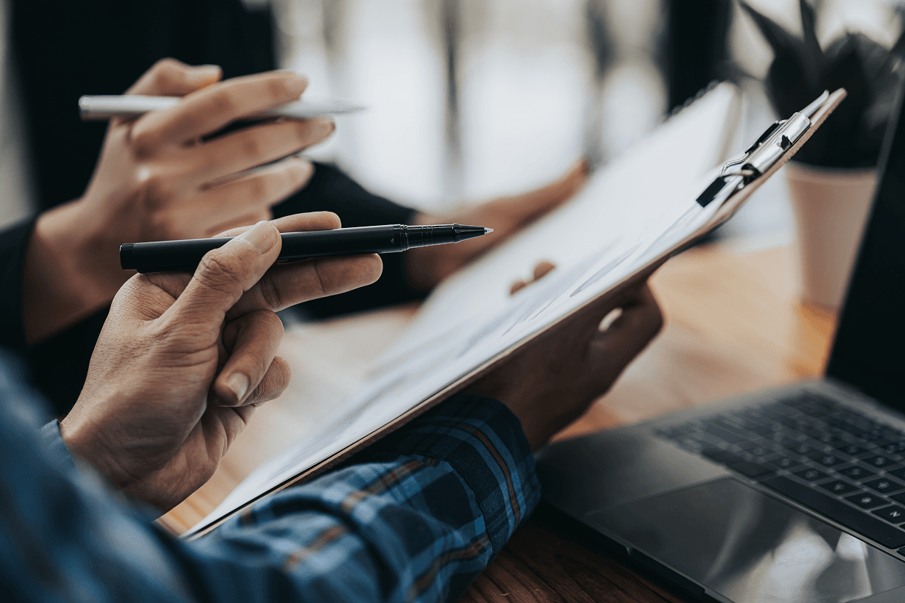 company-members-with-clipboard-pens-checklist